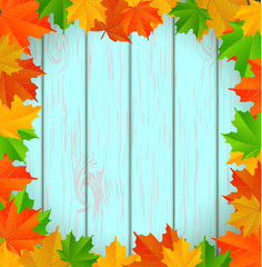 abstract wooden background with maple leaves