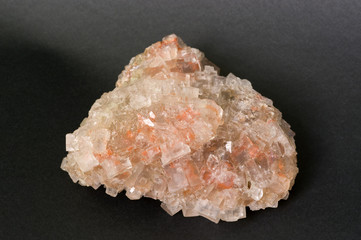 Rock salt (halite) from California. 12cm across.