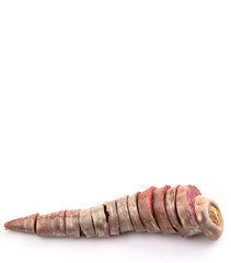 Chopped purple carrot over white background