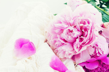 pink peonies and white wedding dress