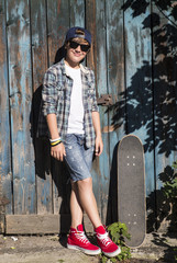 Boy with skateboard in the city © Katarzyna Leszczynsk