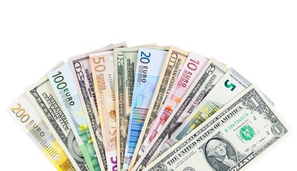 Dollar and euro banknotes on white background