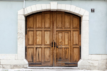 Old brown wooden door.