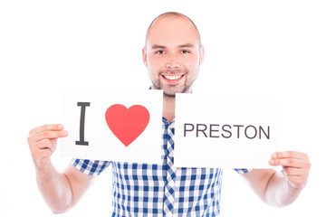 Man with city sign Preston.