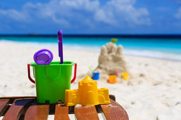 kids toys on tropical beach