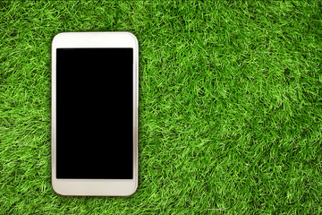 smartphone on grass background