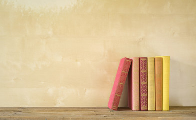 Naklejka premium row of books, free copy space
