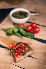 Bruschetta with cherry tomato and herb pesto