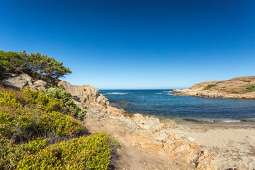 Fototapeta na wymiar Beach and rocky coastline of north Corsica