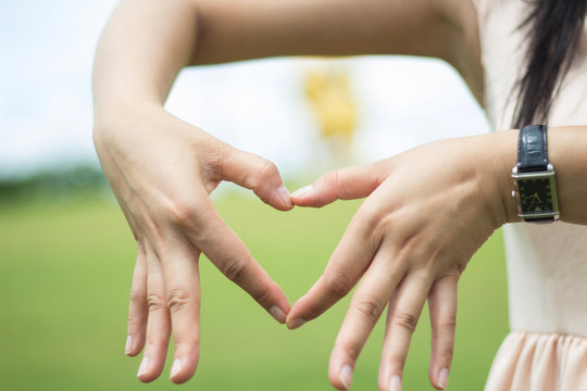 Hands with heart symbol