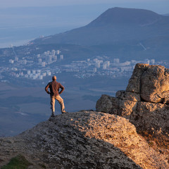 Man on the top of the mountain