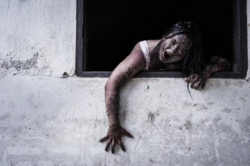 Zombie girl in haunted house