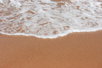 sea with waves and sand