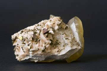Chalcopyrite on dolomite with large calcite crystal. 10cm across