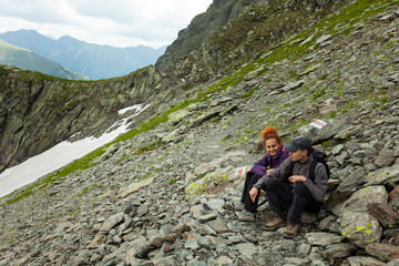 Mother and son hiking in the mountains