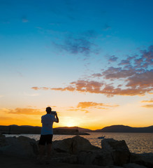 photographer at dusk