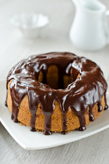 Cake glazed with liquid chocolate