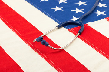 Blue stethoscope over USA flag - studio shoot