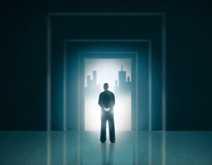 Man in Business Suit Standing on a Door Entrance