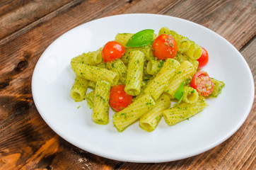 Rigatoni pasta with genoese pesto and sherry tomato