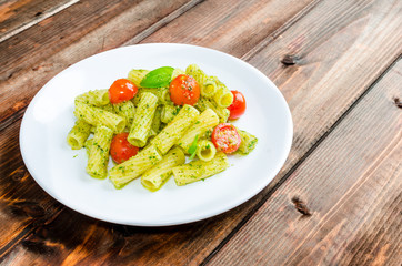 Rigatoni pasta with genoese pesto and sherry tomato