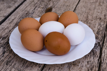 Chicken eggs on a plate
