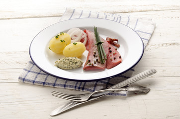 pink herring with potato and herb butter