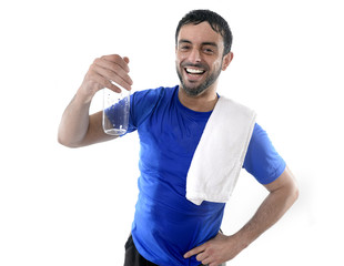 young attractive and athletic sport man drinking water