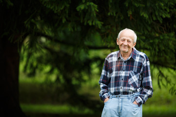 Laughing 80 year old senior elder man outside - 68391001