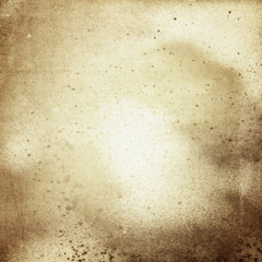 Old paper with spots and scratches