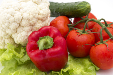 cucumbers, tomatoes, peppers, lettuce, cauliflower