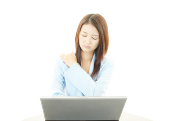 肩痛を訴える女性