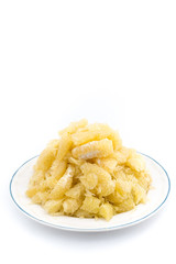 pomelo slices on dish in pyramid shape