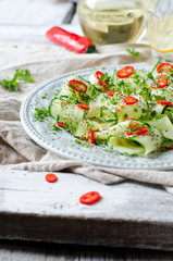 Salad with cucumber, pepper and poppy seeds