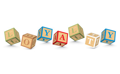 Word LOYALTY written with alphabet blocks