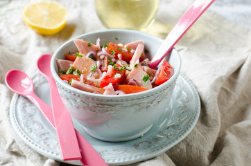 Salad with ham and tomatoes