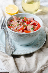 Salad with ham and tomatoes