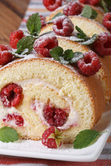 tasty cake with fresh raspberries close up vertical