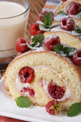 sweet roll with fresh raspberries and mint closeup vertical