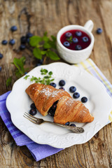 Breakfast - croissant with blueberries