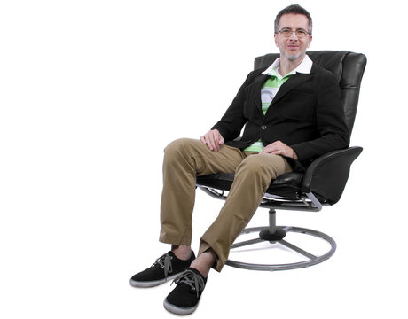 Cool Middle Aged Man Relaxing With Shoes And No Socks