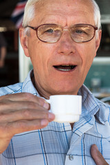 Senior man drinking coffee