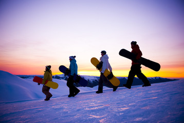 People On Their Way To Snow Boarding