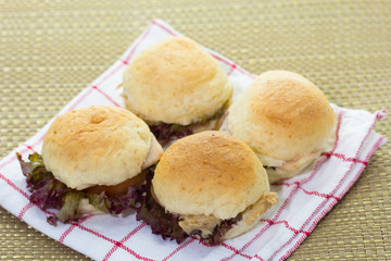 close up of mini burgers