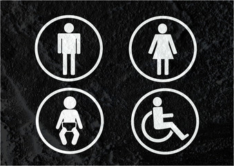 Restroom icon and Pictogram Man Woman Sign on Cement wall textur