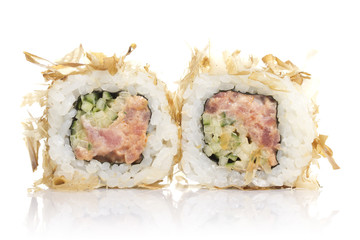 Sushi roll with tuna shavings isolated on white background
