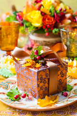 Gift box on festive table
