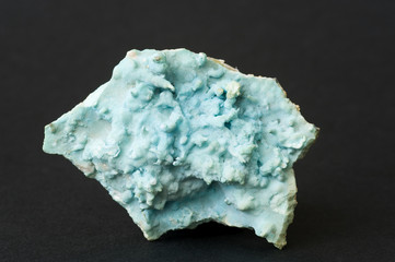 Blue aragonite covered with celadonite. 8cm across.