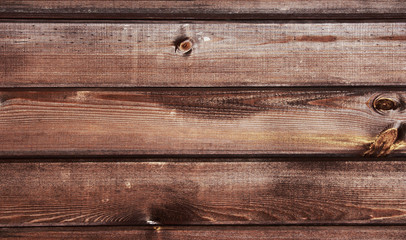 Fototapeta premium Wooden background. Simple wooden planks with branches.