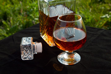Carafe with a glass of brandy - 68416060